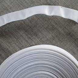 Curved white, easy-sew, petersham ribbon for low waistbands.