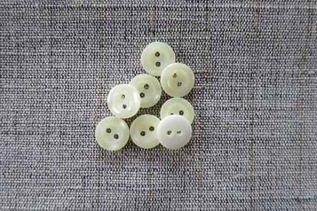 Two-hole, pearlised 11mm buttons, cream