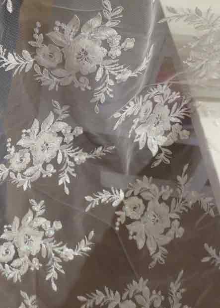 Irridescent embroidered tulle with sequins