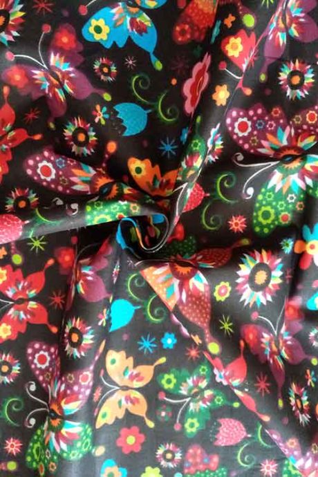 "Butterflies and Flowers" folkstyle 100% cotton print (Black  - 0.7m Remnant)