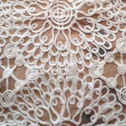 Circular pattern, yarn embroidered tulle (ivory)