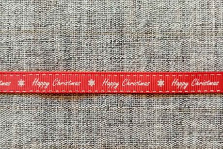 Happy Christmas ribbon, white on red (9mm)