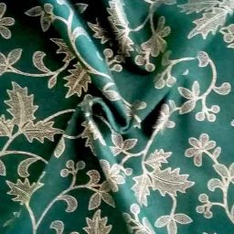 John Louden "Mistletoe and Vine" cotton print (green/gold)