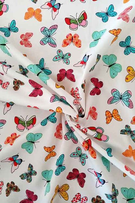 Rose & Hubble printed cotton, "Butterfly Garden" (ivory)