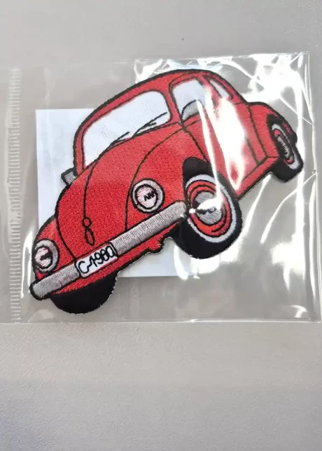 Red beetle car iron-on embroidered patch, 5 x 12cm approx.