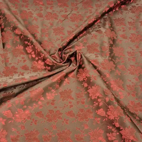 Textured red jacquard with raised motifs