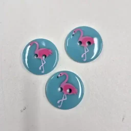 Pink/turquoise 2-hole flamingo button (19mm)