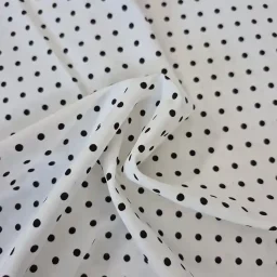 Black and white polka dot cotton-rich stretch polycotton