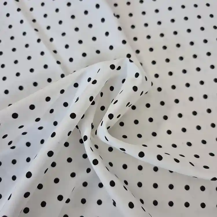 Black and white polka dot cotton-rich stretch polycotton